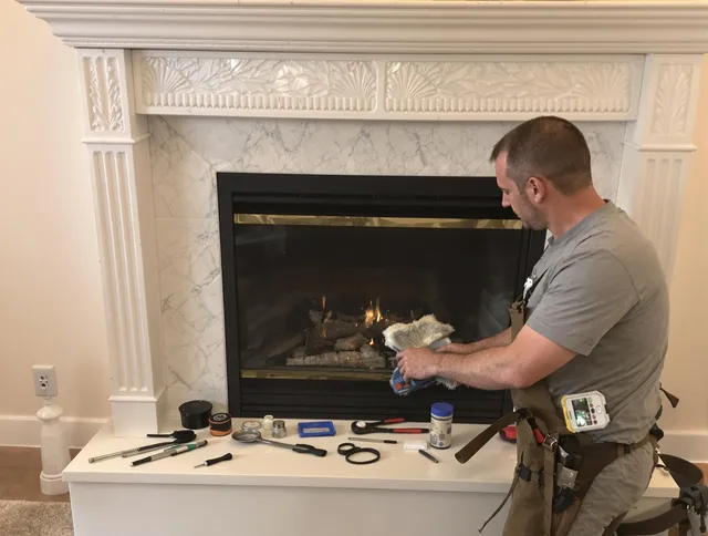 Bethel Chimney Sweep performing fireplace maintenance in Bethel, CT